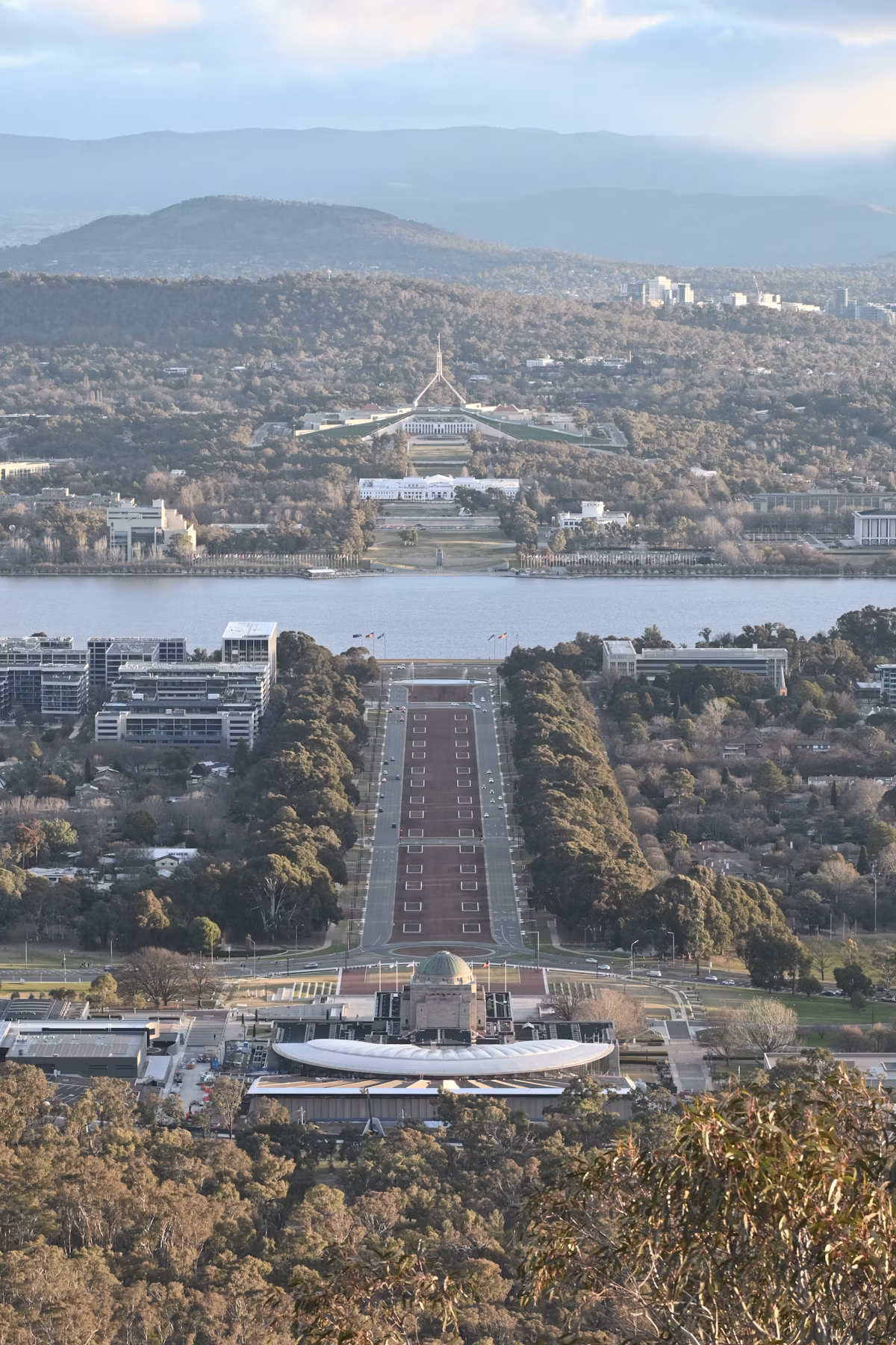 Canberra from Mount Ainslie, Anzac Parade running down to the lake and Parliament House beyond.